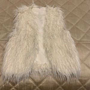 Faux fur white vest from Urban Outfitters